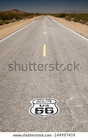 Route 66 Vintage - vertical image of route 66 road leading towards the distant horizon.
