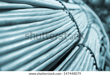 Network and power cables, abstract flow of information in internet networks