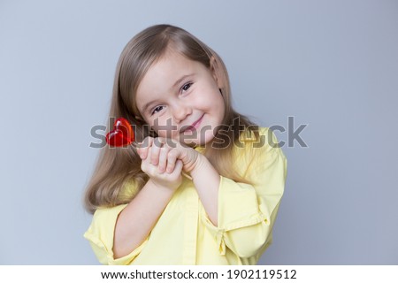 Similar – Image, Stock Photo Child with lollipop