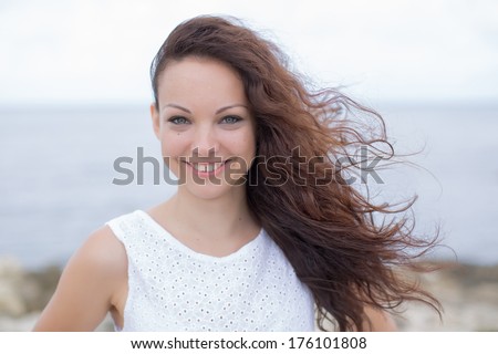 Similar – Image, Stock Photo Smiling woman looking between open door and wall