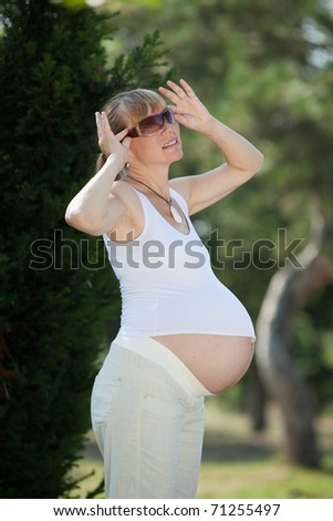 Pregnant woman in the park