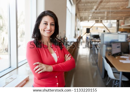 Similar – Image, Stock Photo focused woman with dark hair messaging on cellphone while being near desktop computer in office in Paris