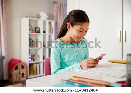 Similar – Image, Stock Photo Little hispanic girl studying in front of the laptop. E-learning, study at home online.