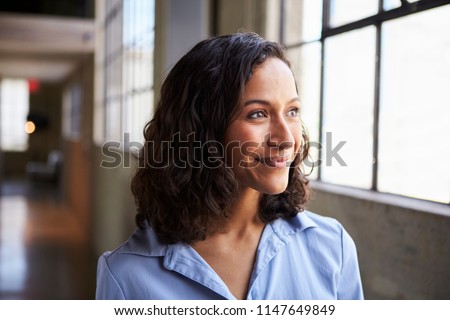 Similar – Image, Stock Photo Young woman with medium length waving her hands raised up in front of colorful flower bush. Glitch effect.