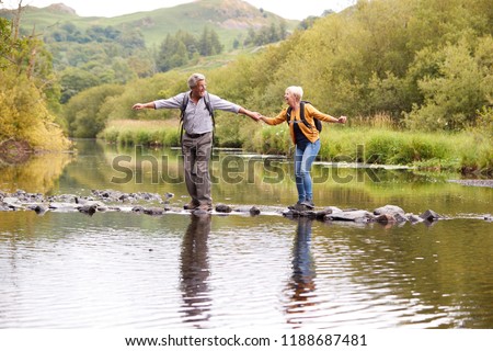 Similar – Menschen, die einen Fluss mit dem Kajak überqueren