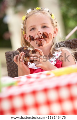 Messy Girl Eating Chocolate Cake