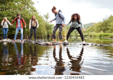 Similar – Image, Stock Photo cross a stream with hiking boots