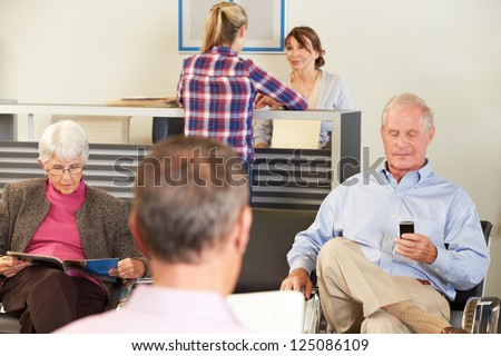 Patients In Doctor's Waiting Room