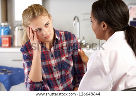 Teenage Girl Visits Doctor\'s Office Suffering With Depression