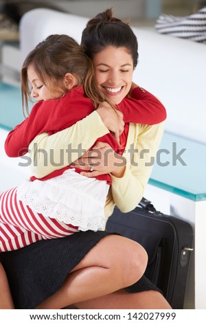 Daughter Greets Mother On Return From Work