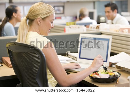 Similar – Image, Stock Photo Ethnic businesswoman eating sushi and working on laptop in cafe