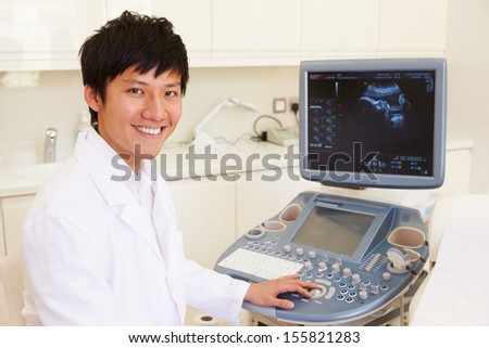 Portrait Of Doctor With 4D Ultrasound Scanning Machine