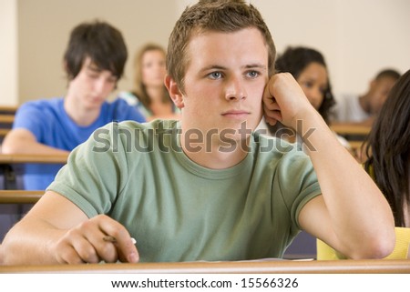 Male college student in a university lecture hall