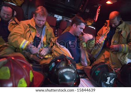 Firefighters preparing for an emergency situation