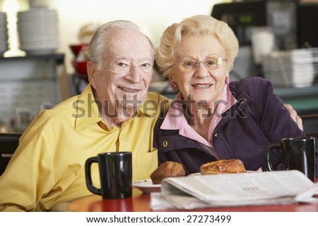 Senior couple having morning tea together