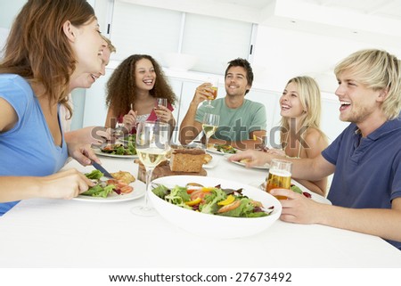 Friends Having Lunch Together At Home