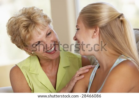 Mother And Daughter Together At Home