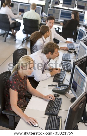 High Angle View Of Stock Traders At Work