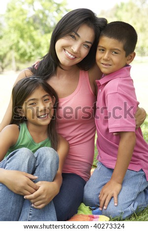 Mother And Children In Park