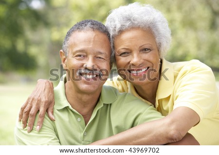 Portrait Of Senior Couple In Park