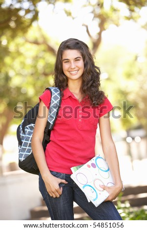 Female Teenage Student In Park