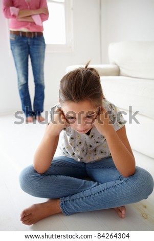 Young girl in trouble with mother