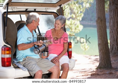 Senior couple on country picnic