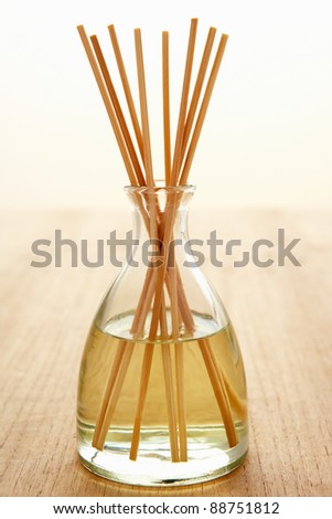 Incense sticks in carafe of water