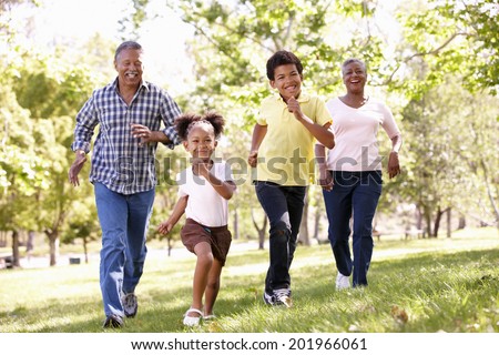 Grandparents and grandchildren in park