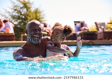 Similar – Foto Bild Mann schwimmt im Pool, blaues Wasser