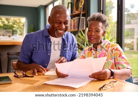 Similar – Image, Stock Photo Black woman smiling sitting on the sand at the beach