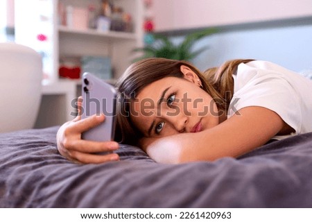 Similar – Image, Stock Photo Teenage girl lying in a blue armchair