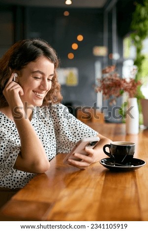 Similar – Image, Stock Photo Woman with earbuds in studio