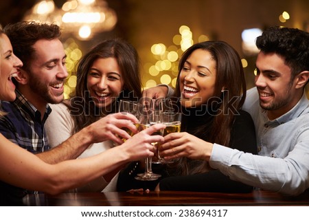 Similar – Image, Stock Photo Ethnic friends relaxing together in city