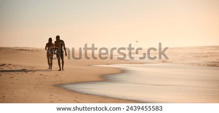 Image, Stock Photo Couple is walking along the ocean