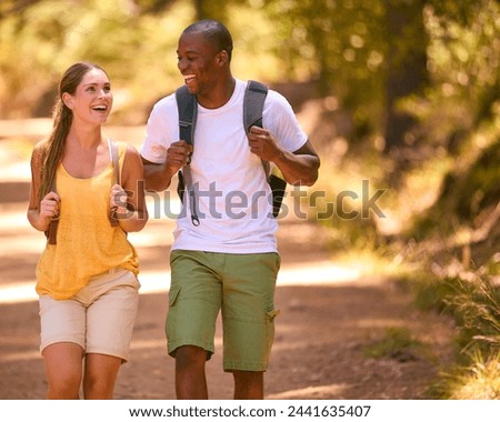 Similar – Image, Stock Photo Couple is walking along the ocean