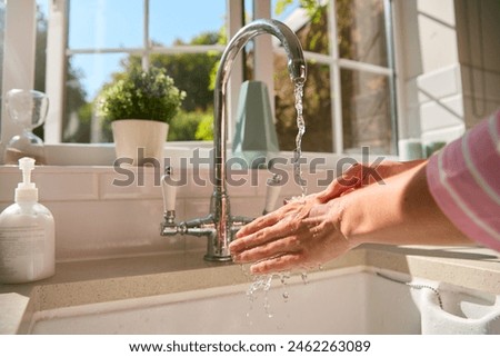 Similar – Image, Stock Photo unrecognizable woman washing hands on a sink with soap. Coronavirus covid-19 concept