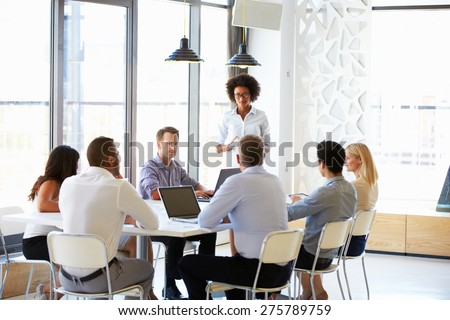 Colleagues at an office meeting