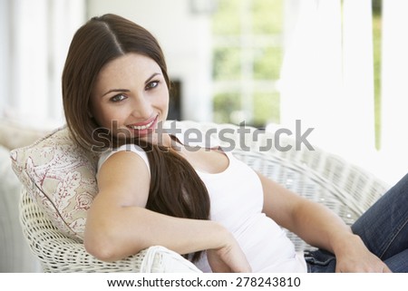 Young Woman Sitting Outside