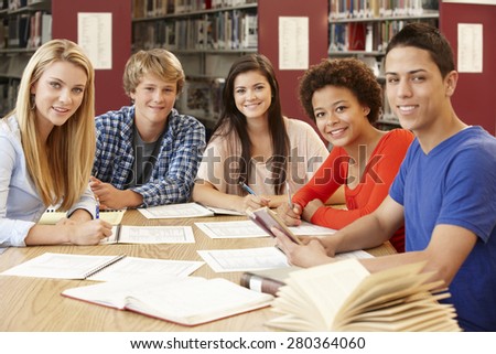 Group of students working together in library
