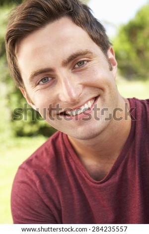 Head And Shoulders Portrait Of Smiling Man