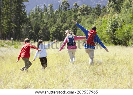 Family On Hike In Beautiful Countryside
