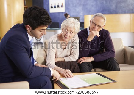 Senior Couple Meeting With Consultant In Hospital