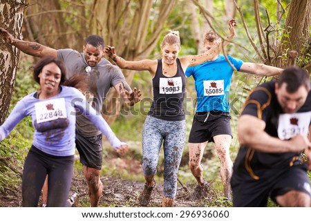 Similar – Image, Stock Photo Young focused ethnic sportswoman on street before training