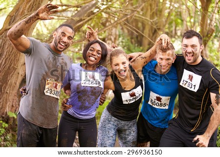 Competitors celebrate completing an endurance sports event