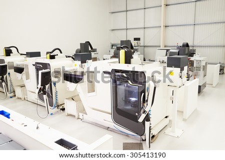 View Of Empty Engineering Workshop With CNC Machines