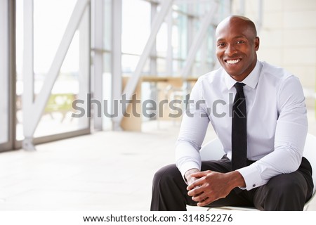 Similar – Image, Stock Photo Man of African ethnicity wrapped in a towel, in a modern bathroom