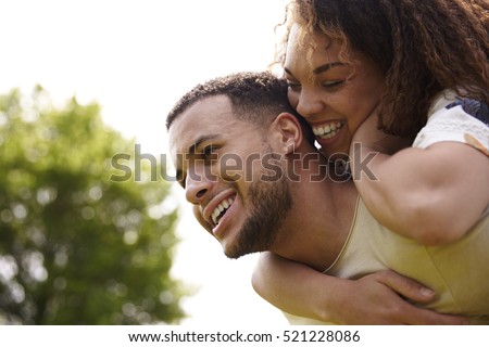 Similar – Image, Stock Photo Romantic loving diverse couple kissing in nature on sunny day