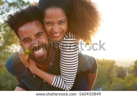 Similar – Image, Stock Photo Romantic loving diverse couple kissing in nature on sunny day