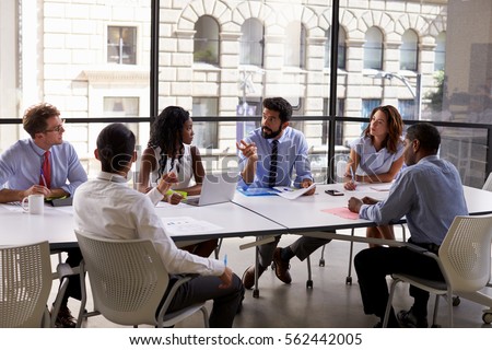 Photo of Corporate business team and manager in a meeting, close up